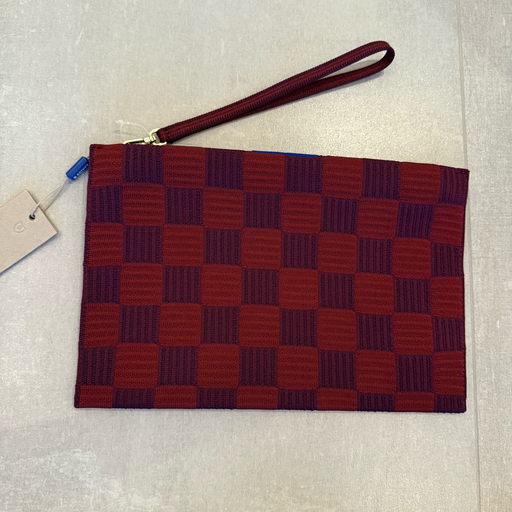 Rothy’s Checker Plum Wristlet